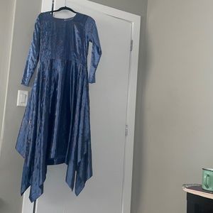 Beautiful long blue dress with gold detailing! Super flattering.